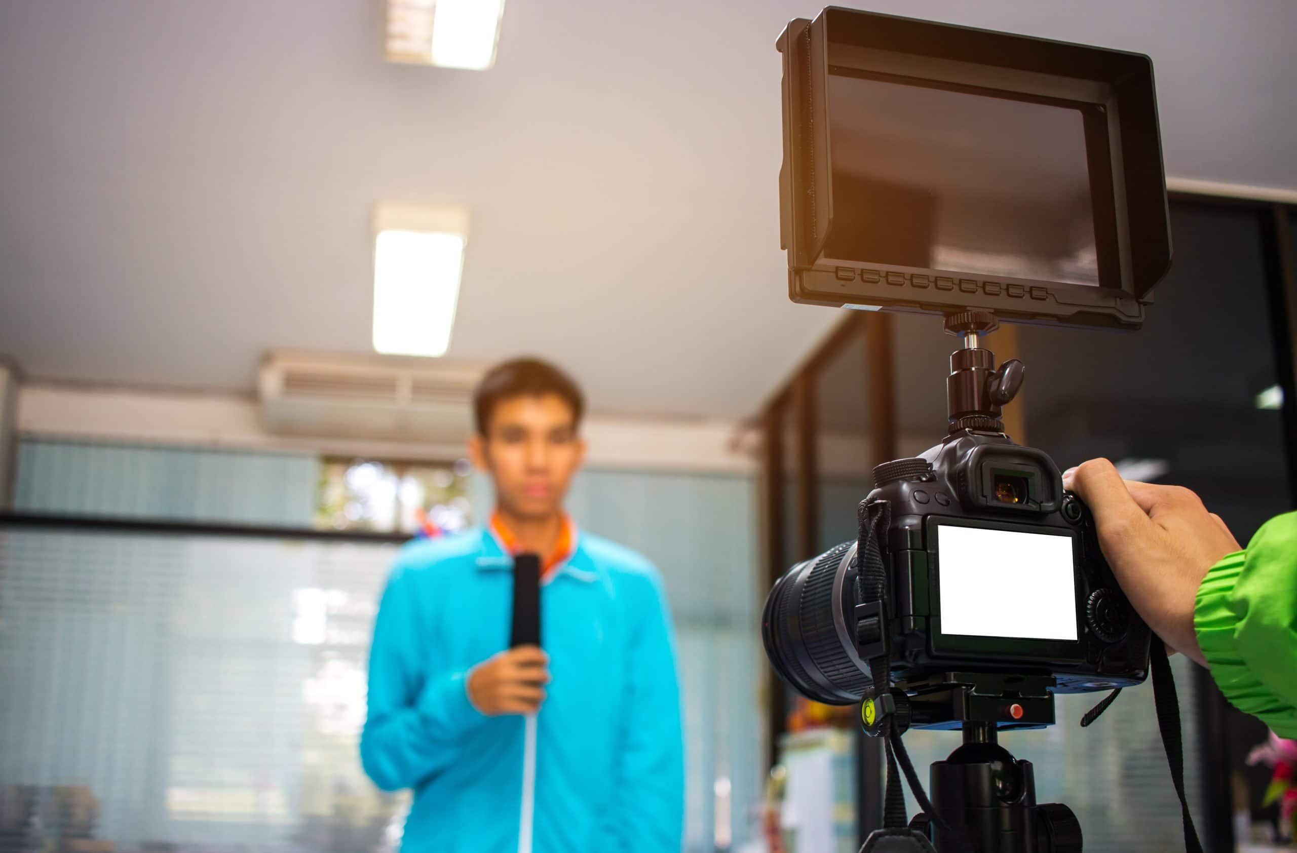 Man on set Video camera, camcorder interviews, operator working - Web Video Ad Space